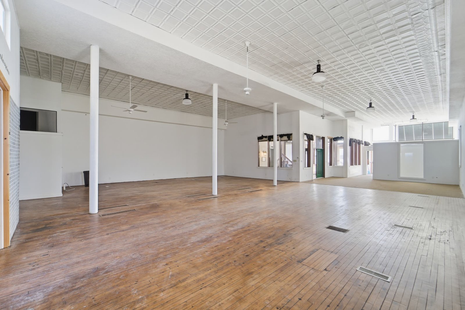 Flexible professional space with historic windows at Clock Tower Lofts
