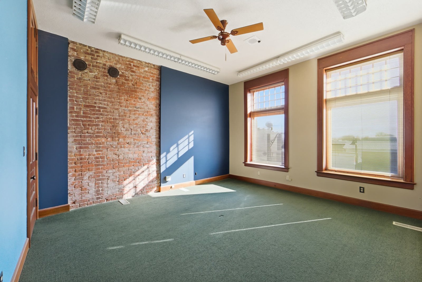 Historic lobby with brick, tile, and original woodwork
